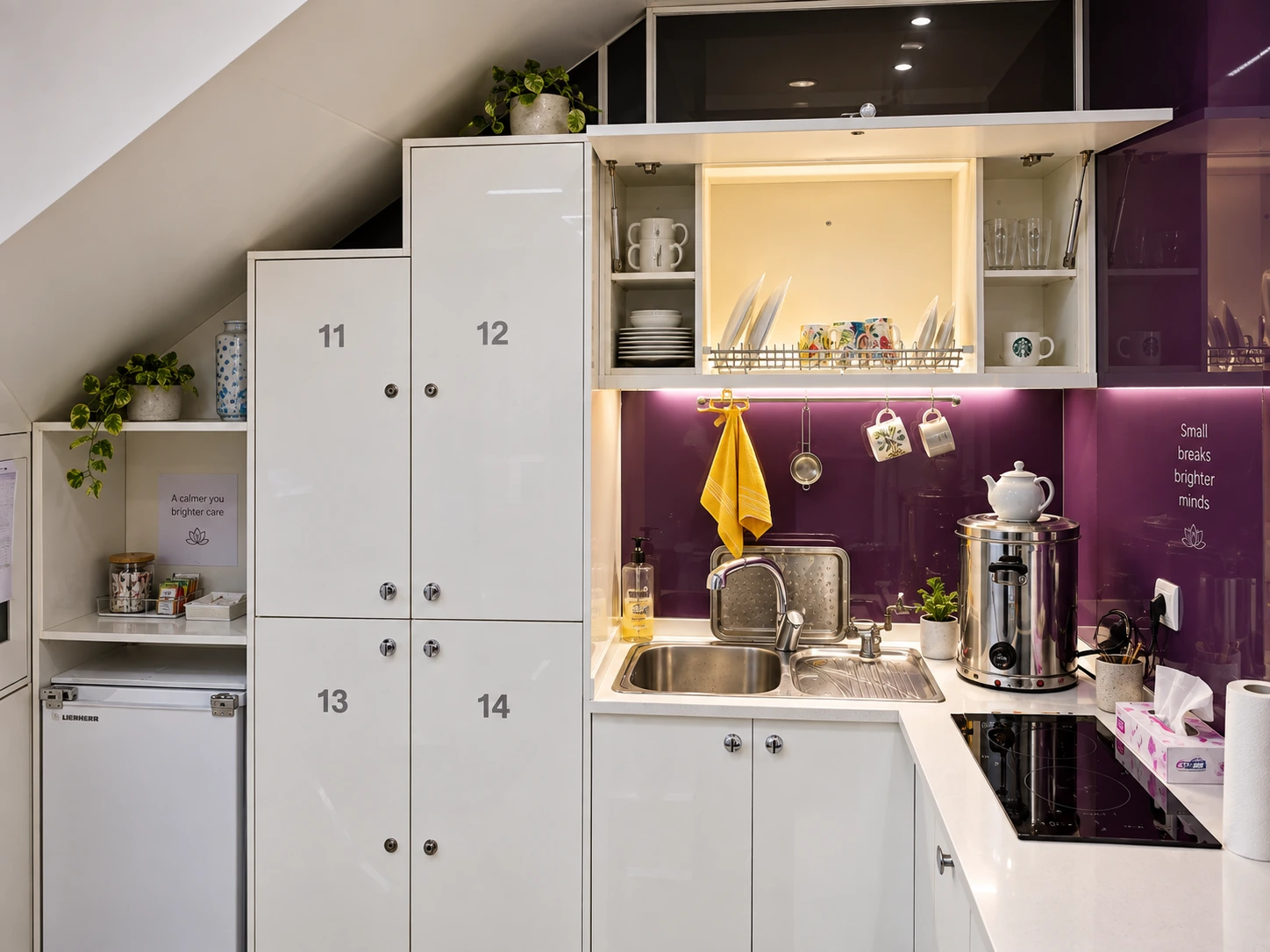 Integrated kitchenette and storage lockers in the MRI rest area at Dey Hospital in Tehran