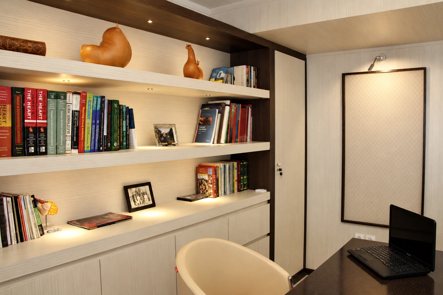 Built-in library and illuminated shelving in Dr. Fathi Cardiology Clinic