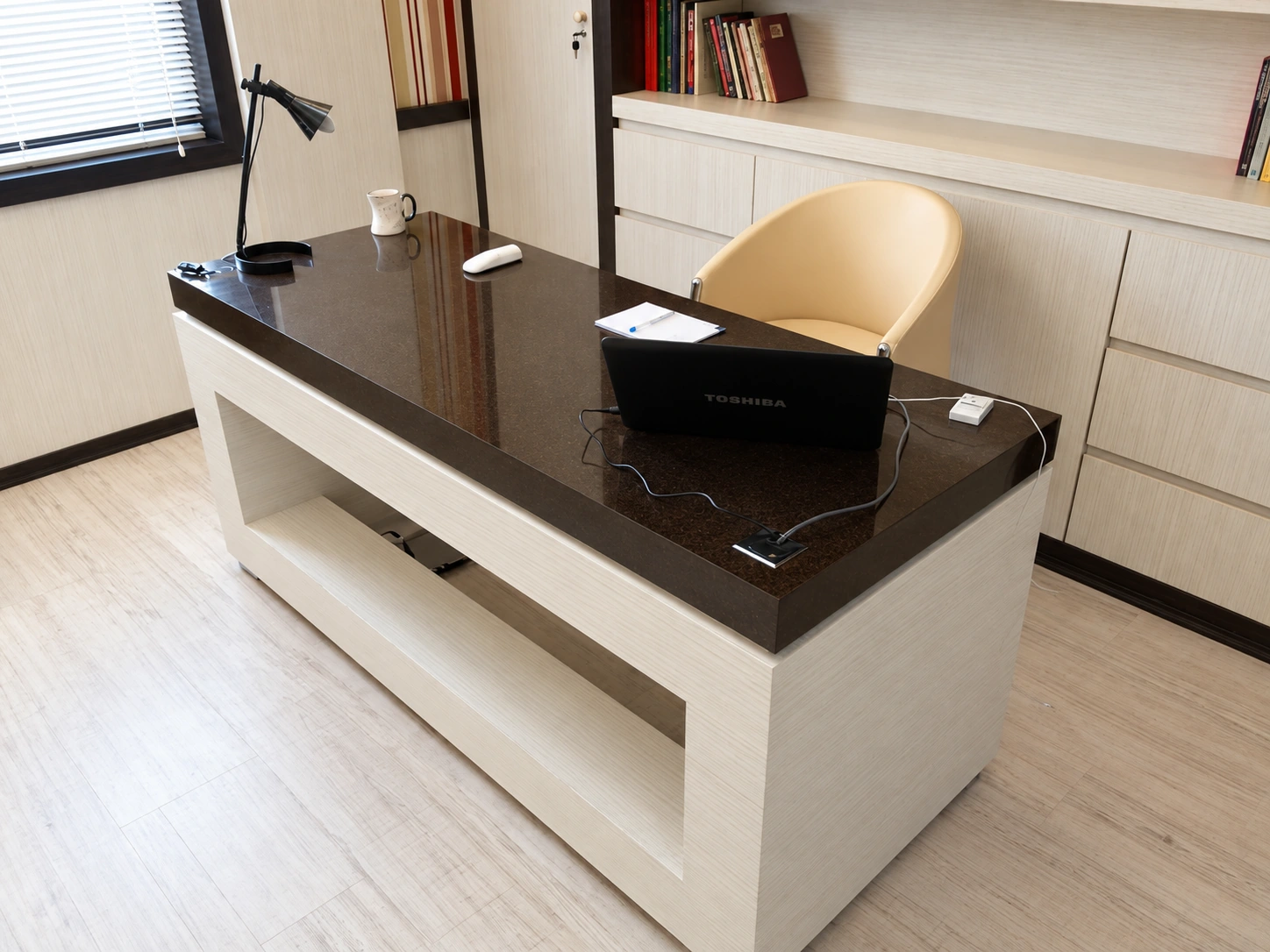 Custom executive desk and workspace detail at Dr. Fathi Cardiology Clinic in Tehran