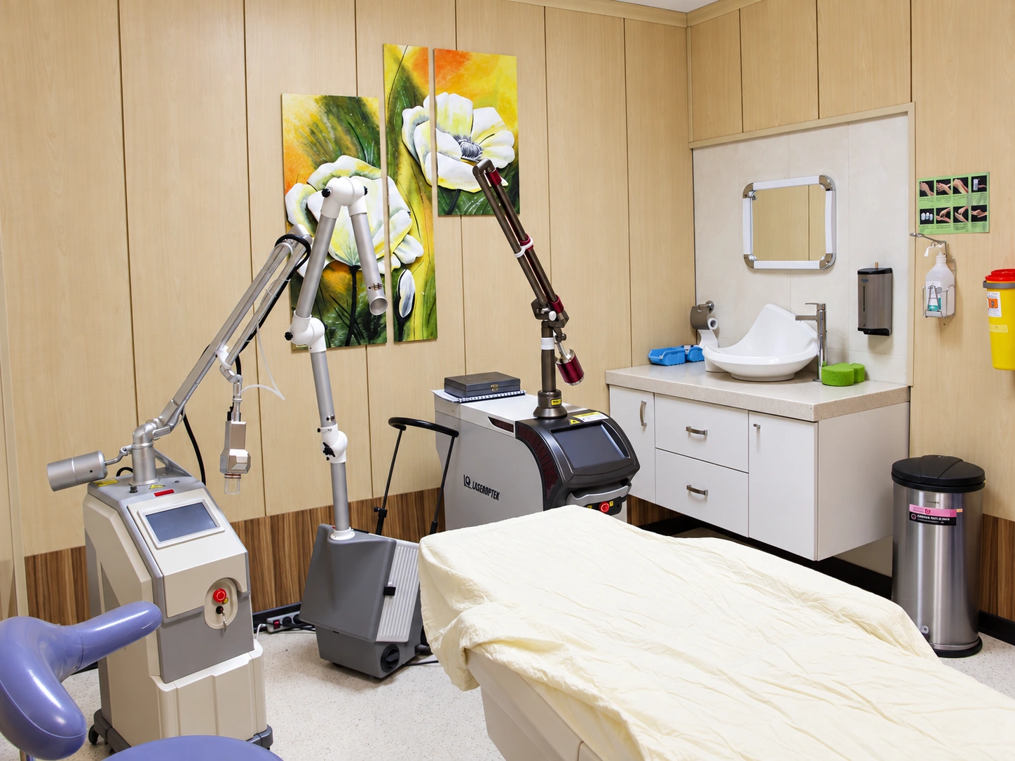 Clinical treatment space at Baqiyatallah Hospital Dermatology and Hair Clinic with specialized equipment and perimeter work surfaces