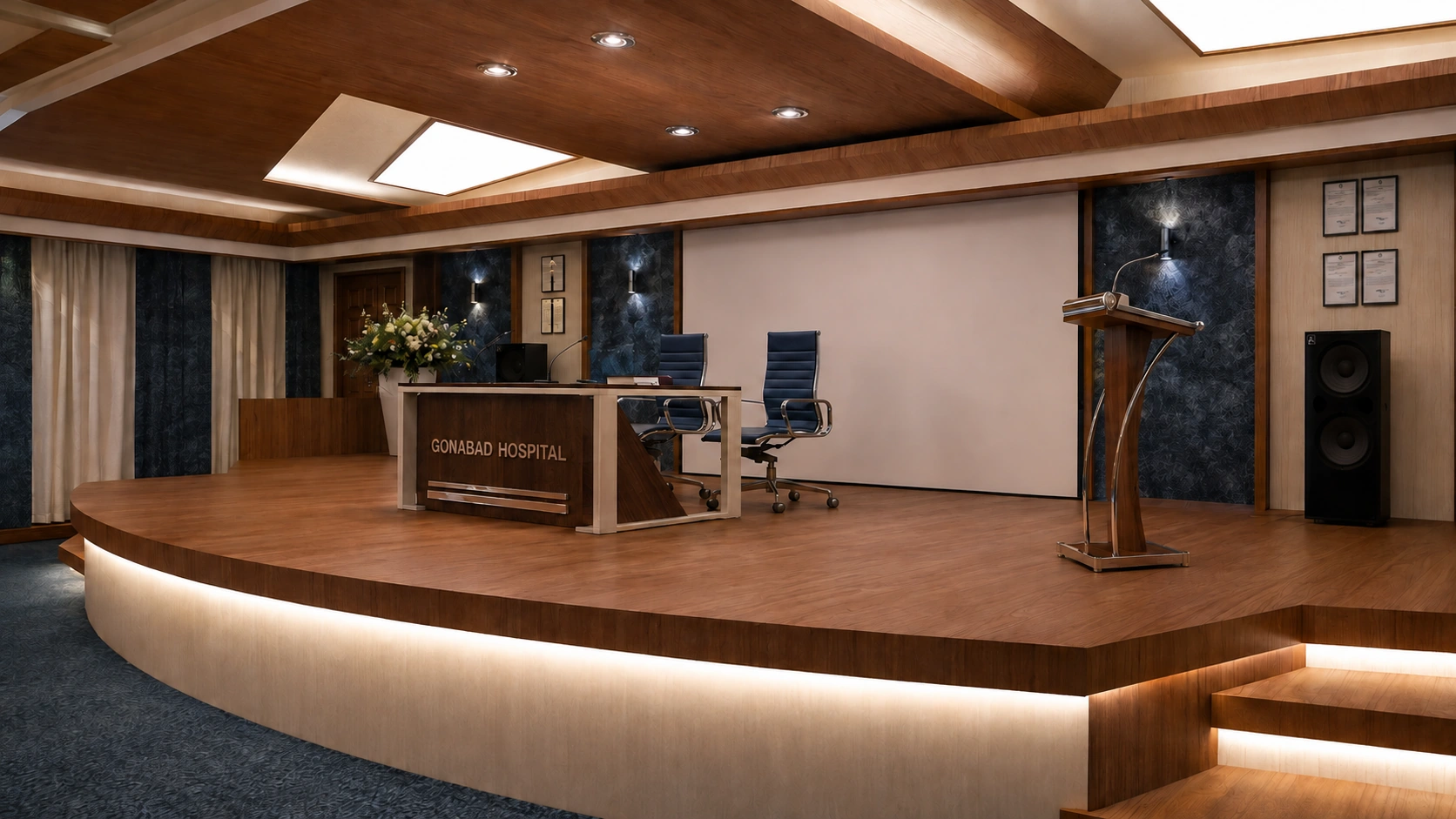 Timber stage at Behloul Gonabadi Hospital auditorium with presentation desk, lectern, projection screen and integrated lighting