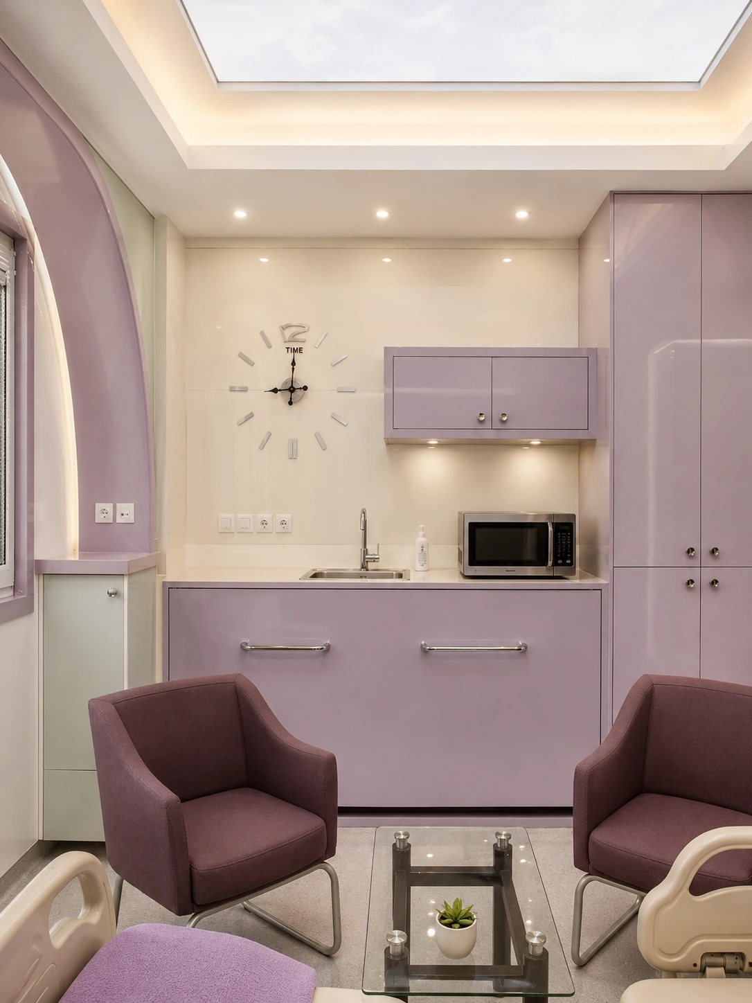 Support and lounge area in the Purple VIP room at Day Hospital with seating, sink, cabinetry and integrated lighting