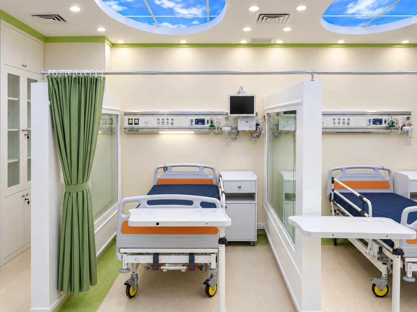 Post-CCU treatment bays with hospital beds, glass partitions, curtains and ceiling lighting features