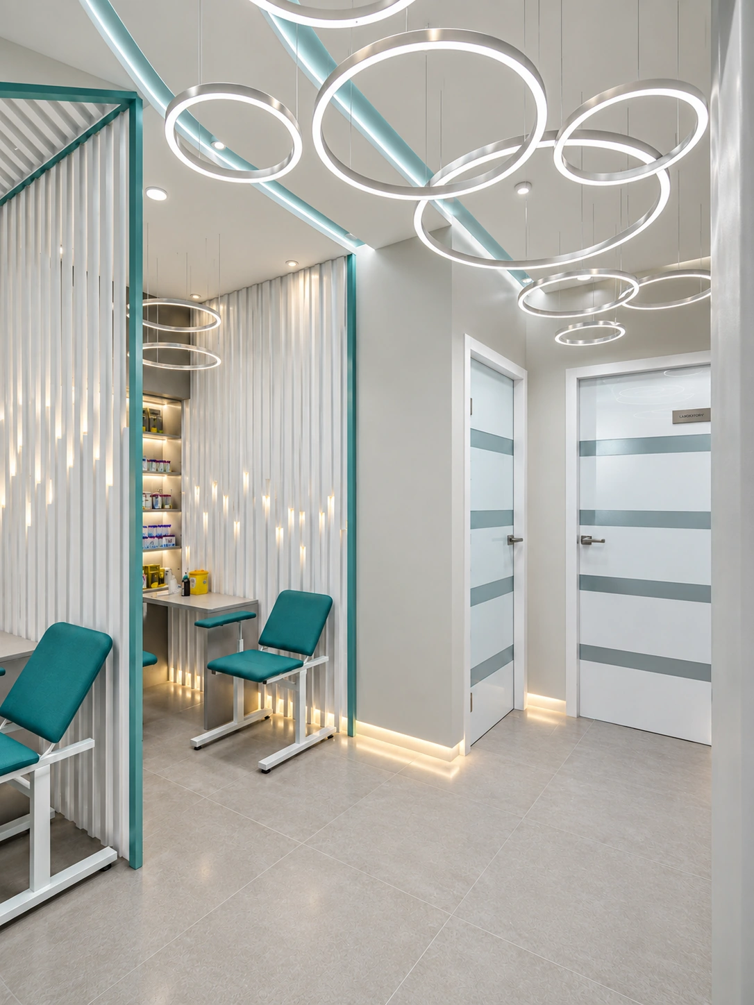 Laboratory corridor and sampling area with suspended circular lights and vertical screens at Dr. Rashidinejad Laboratory