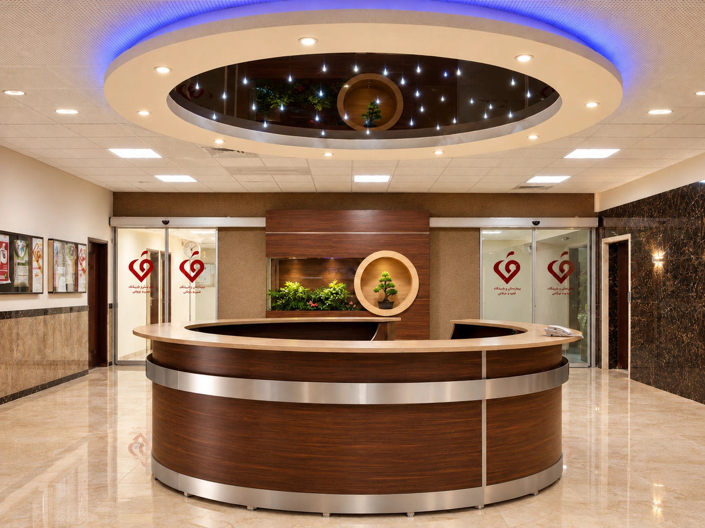 Central reception desk at Shahid Rajaee Heart Center lobby with timber finish and metal bands beneath a circular ceiling