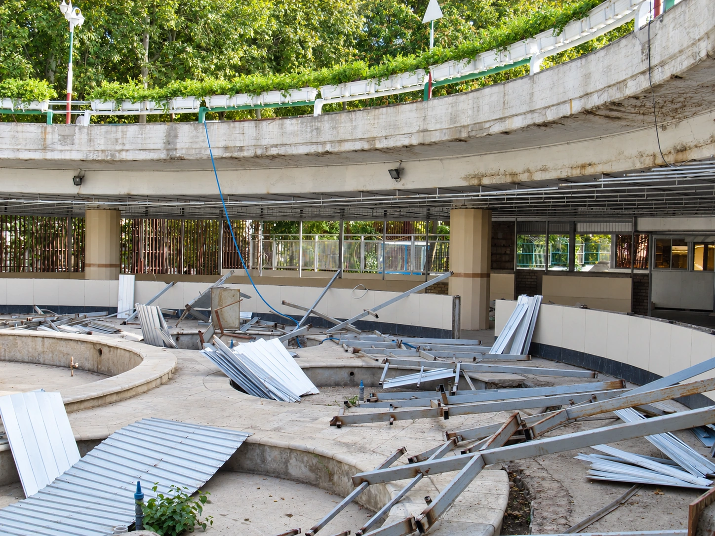Shahid Rajaee Heart Center staff restaurant area before renovation with exposed site and roof framing