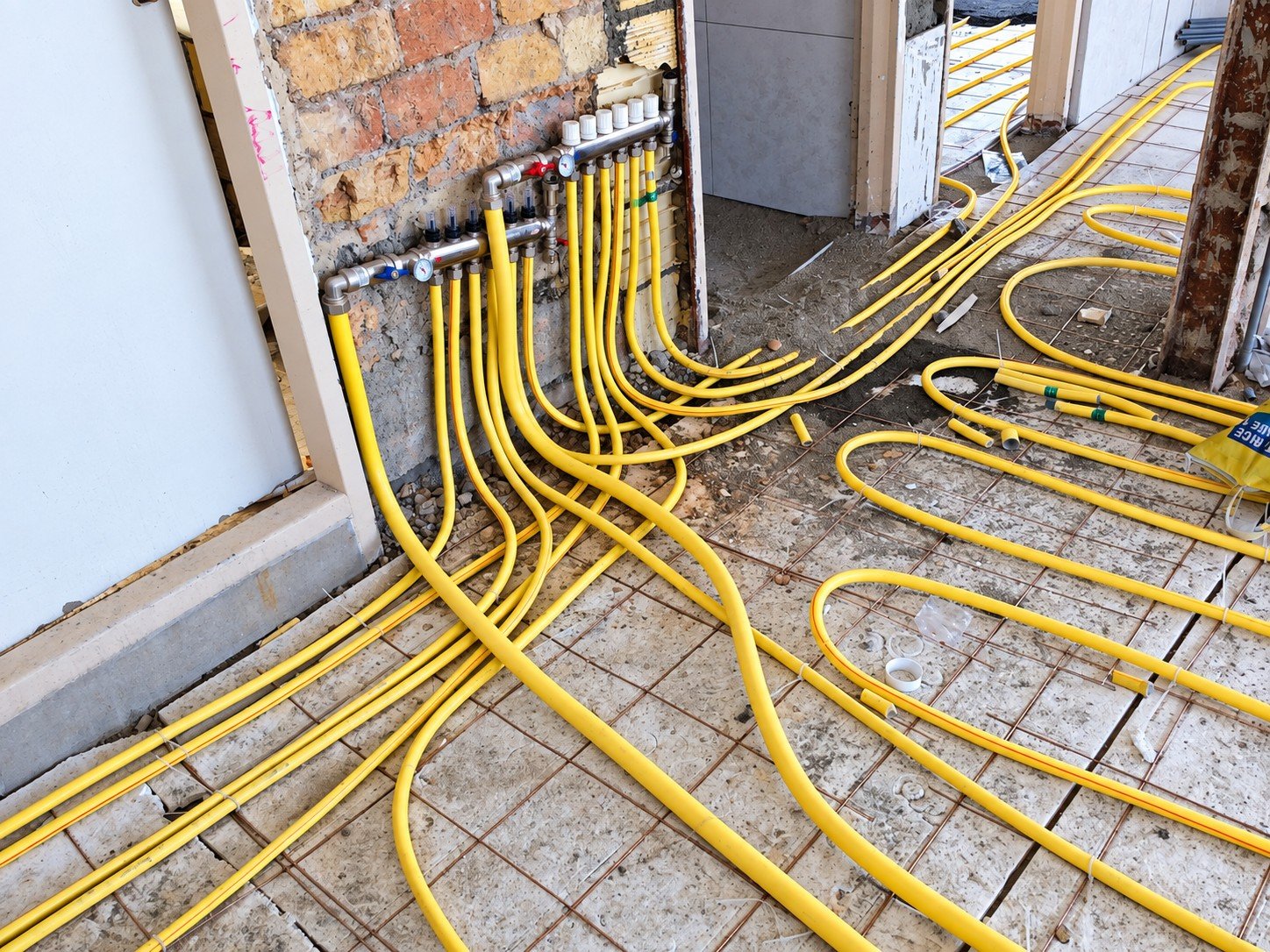 Plumbing and mechanical infrastructure installation during Yekta Laboratory construction