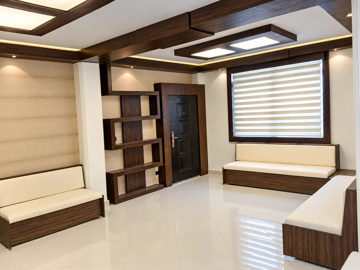 Jam Building waiting lounge with walnut-toned joinery, cream seating and integrated ceiling lighting