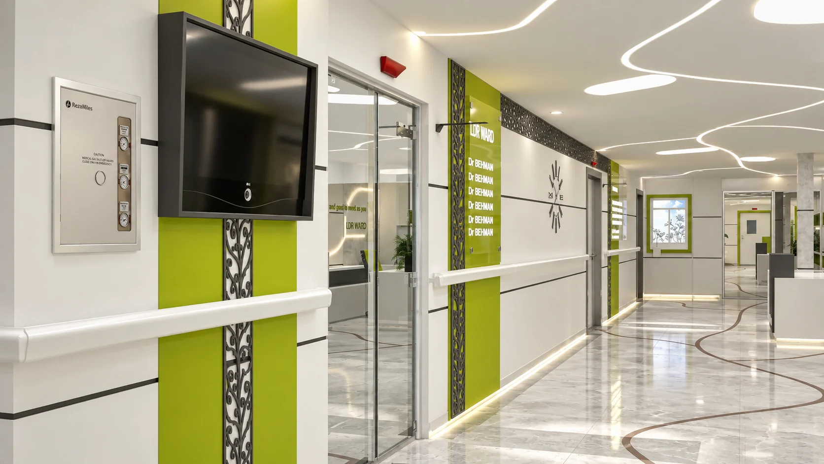 Tehran Pars Hospital LDR ward corridor with reception point, linear lighting and wayfinding elements