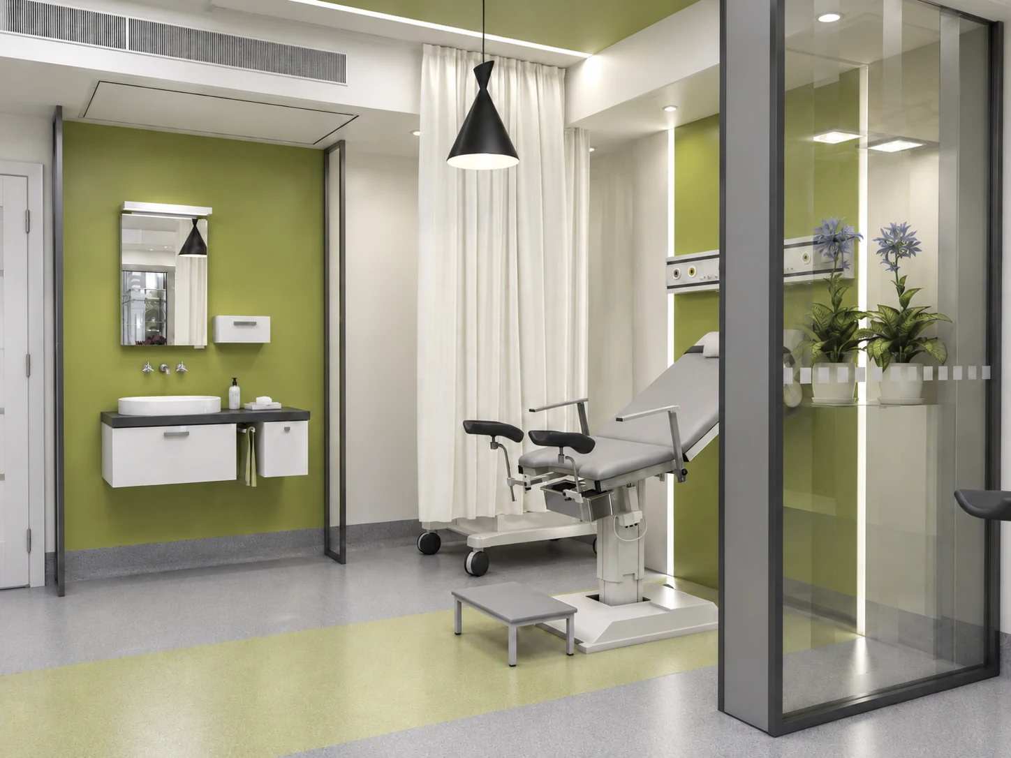 Women’s examination space at Tehran Pars Hospital with sink, exam chair and privacy curtain